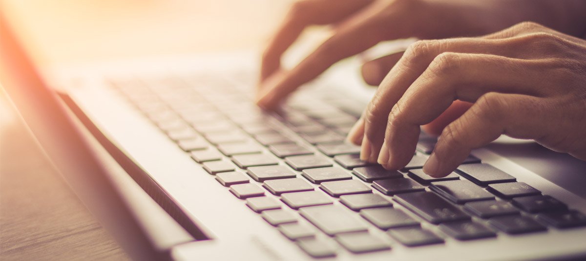 person-typing-on-laptop